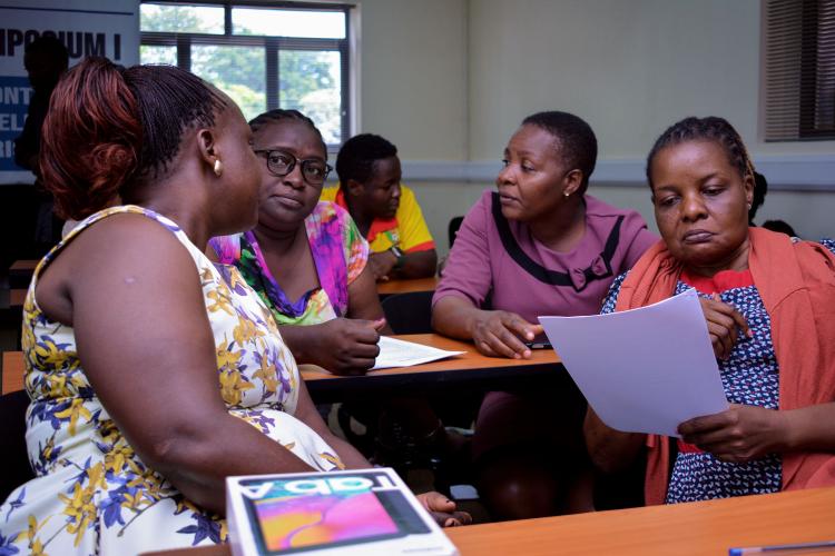 Participants in the training reviewing one of the data tools